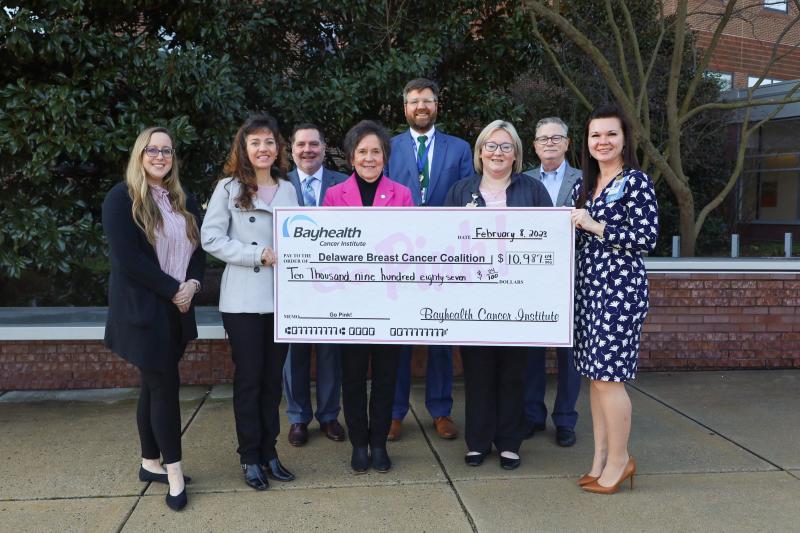 Bayhealth and Delaware Breast Cancer Coalition representatives gathered for the ceremonial Go Pink! check presentation in the amount of $10,987 from the Bayhealth Cancer Institute to the coalition following the 2022 campaign. Shown are (l-r) DBCC Program Manager Stephanie Cumella; DBCC Deputy Executive Director Francesca Vogel; Bayhealth Foundation Director of Development Charles Desch; DBCC Education and Survivorship Program Director Lois Wilkinson; BCI Executive Director John Shevock; BCI Community Outreach Coordinator Katie Killen; Bayhealth Foundation President Lindsay Rhodenbaugh, MD; and BCI Manager Stephanie McClellan, MSN, RN, CMSRN. SUBMITTED PHOTO